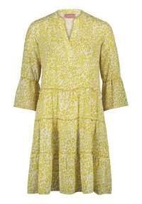 Żółta sukienka w cętki lamparta z dekoltem w serek, rękawami o długości trzech ćwiartek i warstwowym krojem. Wykonana z lekkiego materiału o miękkiej teksturze.