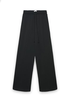Black wide-leg pants made of soft fabric, featuring an elastic waistband with a drawstring and two vertical seams on the front.