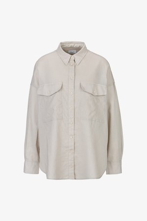 Lichtbeige, langslavende button-up shirt met twee borstzakken, een kraag en een relaxed fit. Gemaakt van ademende stof.