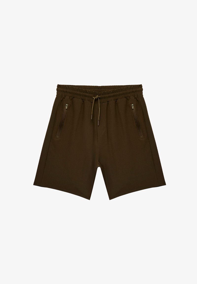 Bruine sportshorts van gladde stof. Voorzien van een elastische tailleband, trekkoord en twee ritszakken aan de zijkanten.