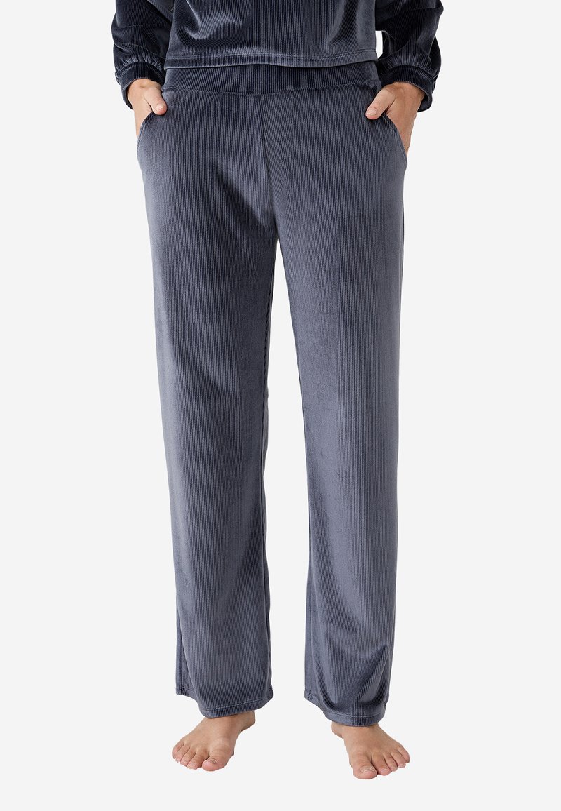Grijze corduroy loungebroeken met een ontspannen pasvorm, voorzien van zijzakken en een elastische tailleband, gladde textuur en volwaardige lengte.