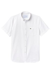 Krótki rękaw, biały, bawełniany koszula zapinana na guziki, z kieszonką na piersi z zielonym logo krokodyla oraz klasycznym kołnierzykiem.