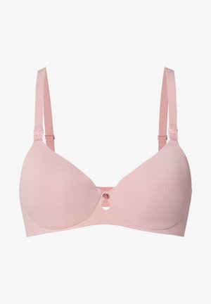 Soutien-gorge rose pâle avec des bonnets moulés, des bretelles réglables et un détail décoratif au centre. Texture lisse, design simple et bords sans couture.