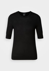 Svart kortermet genser laget av fin merinoull. Rund hals, smal passform, glatt tekstur, minimalistisk design, ingen synlige mønstre eller aksenter.