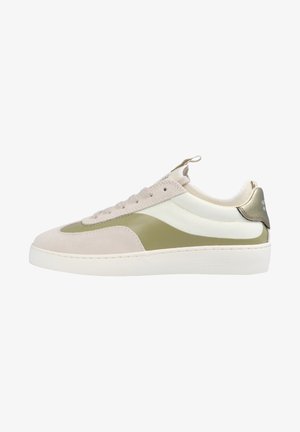 Sneaker with a beige suede upper, green side panel, white textile accents, and a cream rubber sole. Features flat laces and a pull tab.