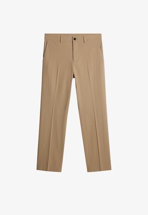 Beige byxor i ett texturerat tyg med avslappnad passform. Har en knappstängning fram, sidofickor och inga synliga mönster.