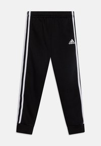 Pantaloni della tuta neri con strisce laterali bianche, vita elastica e polsini a costine. Presenta un logo Adidas bianco ricamato sulla coscia.