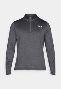 Pitkähihainen urheilupaita tummanharmaana, jossa on puolivetoketjullinen kaulus, teksturoitu kangas ja pieni valkoinen logo ylävasemmalla puolella.