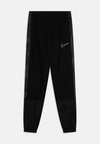 ACADEMY - Tracksuit bottoms - black