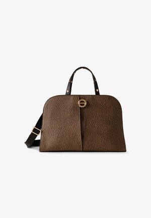 Brown textured handbag with rounded edges, black handles with gold studs, and a gold circular clasp in the center, plus an adjustable black shoulder strap.