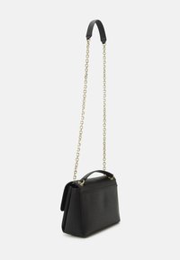 Calvin Klein RE LOCK  CROSSBODY - Taška cez plece - black
