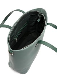 Roheline nahast käekott kahe sangaga, avatud lukuga ülaosaga ja musta kangaga sisuga, mis sisaldab lukuga taskut.