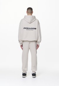 Pegador COLNE LOGO JACKET - Sudadera con cremallera - washed dust cream