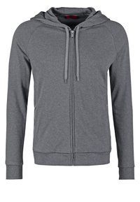 Sweat à capuche gris à fermeture éclair avec capuche à cordon, manches longues, poches latérales et poignets côtelés. Confectionné dans un tissu doux et texturé.