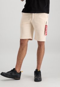Alpha Industries X-FIT - Donji dijelovi trenirke - jet stream white