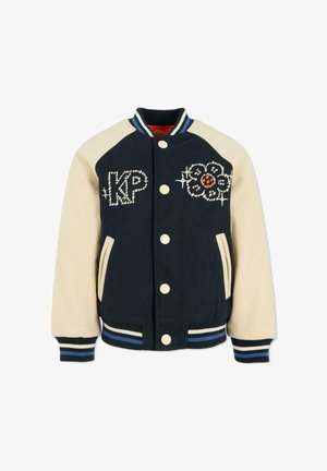 Navy blue varsity jacket with beige sleeves, featuring embroidered KP and floral designs. Button closure and striped ribbed cuffs.