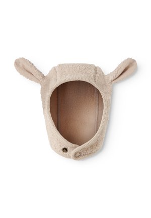 Bonnet bébé en polaire beige doux avec deux petites oreilles et des boutons-pression à l'avant pour la fermeture.