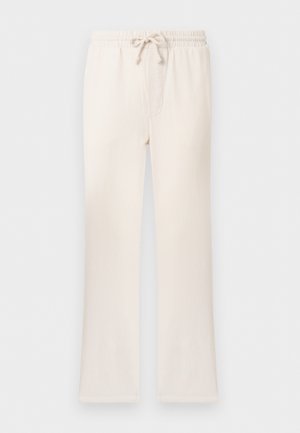 Strickhosen in Cremefarbe mit elastischem Bund und Kordelzug, ausgestattet mit geraden Beinen und einer dezenten gerippten Textur.