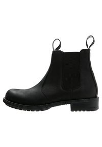 Black leather Chelsea boot featuring elastic side panels, pull tabs, a smooth texture, and a low block heel with a ridged outsole.