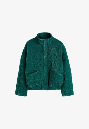 Tűzött pávakék dzseki álló gallérral, gumis szegéllyel és két első zsebbel. A texturált anyagon levélminta található.