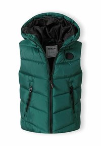 Zeleni puffer prsluk s patentnim zatvaračem sprijeda, dva bočna džepa i crnu kapu. Ima kviltani uzorak i okruglu oznaku s logotipom.