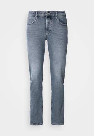 Light blue denim jeans with a straight cut, five-pocket design, and subtle fading. Features a button closure and belt loops.