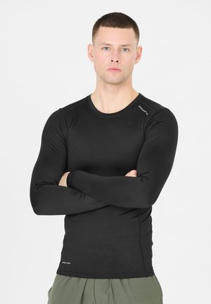 Zwarte langemouwen shirt van stretchstof, met een ronde halslijn en een getailleerd ontwerp, met een logo-accent op de schouder.
