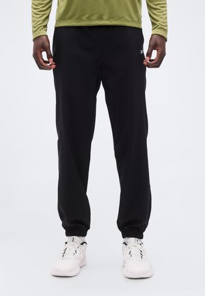 ID TRAIN PANTS - Παντελόνι φόρμας - black