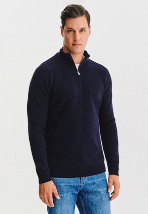 - Sweter
