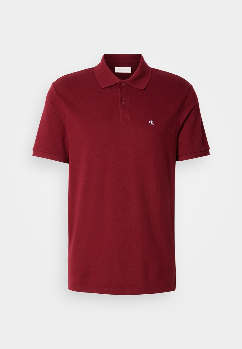 Burgundzka koszulka polo wykonana z bawełny, z kołnierzykiem, krótkimi rękawami i małym logo na piersi. Gładka tekstura i klasyczny design.
