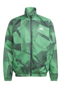 Veste verte Adidas avec motif géométrique rayé foncé, fermeture éclair complète à l'avant, col haut, poignets élastiques et logo Adidas sur la poitrine.