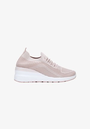 Light pink sneaker with a knitted upper, round toe, and elastic laces. Features a chunky white midsole and textured accents on the sides.
