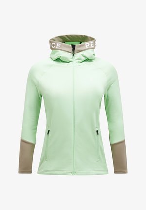 Giacca a vento verde chiaro con cappuccio e colletto beige. Presenta una zip frontale e tasche laterali. Realizzata in materiale liscio e stretch.