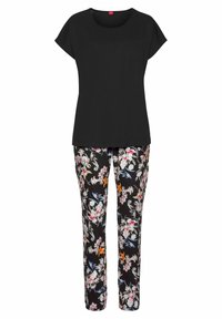 Black short-sleeve top with a round neckline paired with floral-patterned trousers featuring multicolored flowers on a black background.