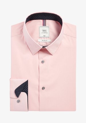 Slim fit roze dress shirt, katoen materiaal, button-down kraag, lichte textuur, marineblauwe patroon aan de binnenkant van de cuff, enkele knop op de cuff.