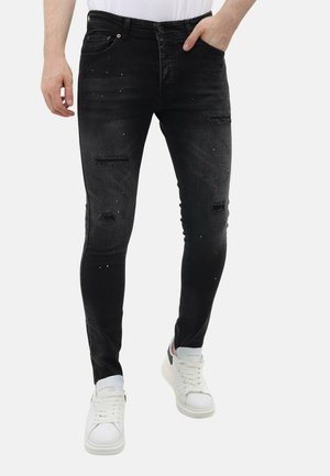 Local Fanatic RIPPED MET VERFSPATTEN - Jeans Skinny Fit - zwart