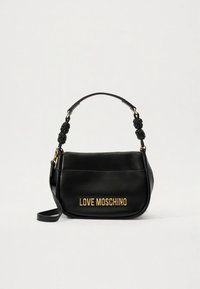 Black leather handbag with a curved shape, featuring a knotted strap, gold "LOVE MOSCHINO" logo, and smooth texture.