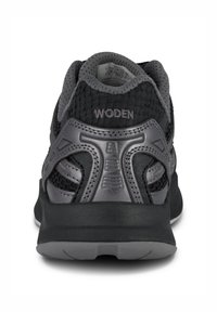 Black and gray athletic shoe featuring a mesh upper, textured heel support, padded collar, and rubber sole with patterned tread.