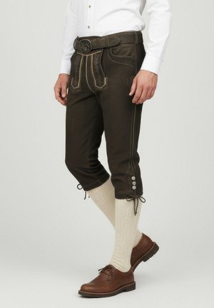 Dark brown lederhosen with embroidered accents, knee length, side buttons, and paired with cream-colored knee socks and brown shoes.