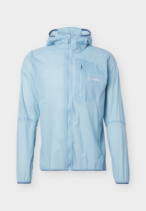 Lyseblå hættetrøje til udendørsbrug med fuld lynlås foran, lynlåslomme på brystet og elastiske manchetter.