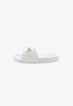 White slide sandal made of synthetic material, featuring a smooth texture, a wide strap, and a decorative gold chain accent.