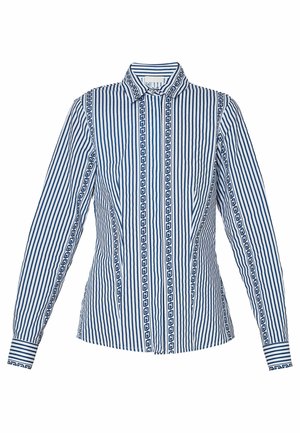 Camicia a maniche lunghe a righe in bianco e blu navy, con colletto, righe verticali e rifinitura decorativa sul davanti in un motivo geometrico.