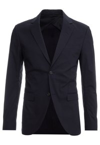 Marinblå kavaj i bomull. Har en notch-lapel, en knappstängning och en bröstficka. Slät textur och skräddarsydd passform.