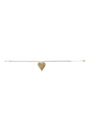 Gold heart-shaped pendant with intricate filigree design, accented with small blue gems, attached to a braided turquoise and gold chain.
