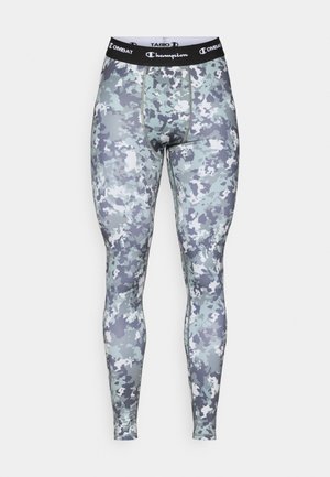 Camouflage sportleggings in grijstinten en wit, met een zwarte tailleband met "Champion" logo en een getailleerd ontwerp.