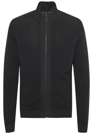 Black zip-up cardigan with ribbed texture, high collar, and straight sleeves. Features a smooth zipper and fitted hem at the waist.