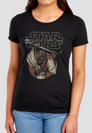 Black t-shirt with Star Wars text and a character holding a weapon above its head in a dynamic pose.