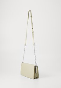 Calvin Klein CONVERTIBLE MINI BAG - Geantă crossbody - eucalyptus