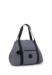 Borsa da viaggio a fantasia bianco e nero con tessuto resistente, doppie maniglie nere, tasca frontale con cerniera e dettaglio con pon pon.