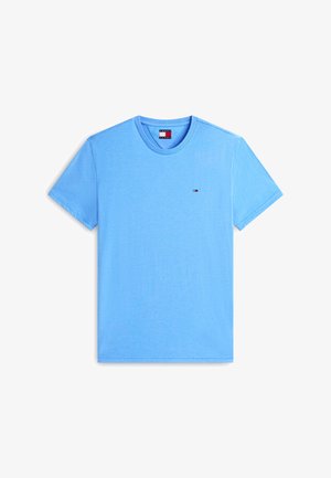 Světle modré bavlněné tričko s krátkým rukávem, kulatým výstřihem a malým vyšívaným logem Tommy Jeans na levé straně hrudi.
